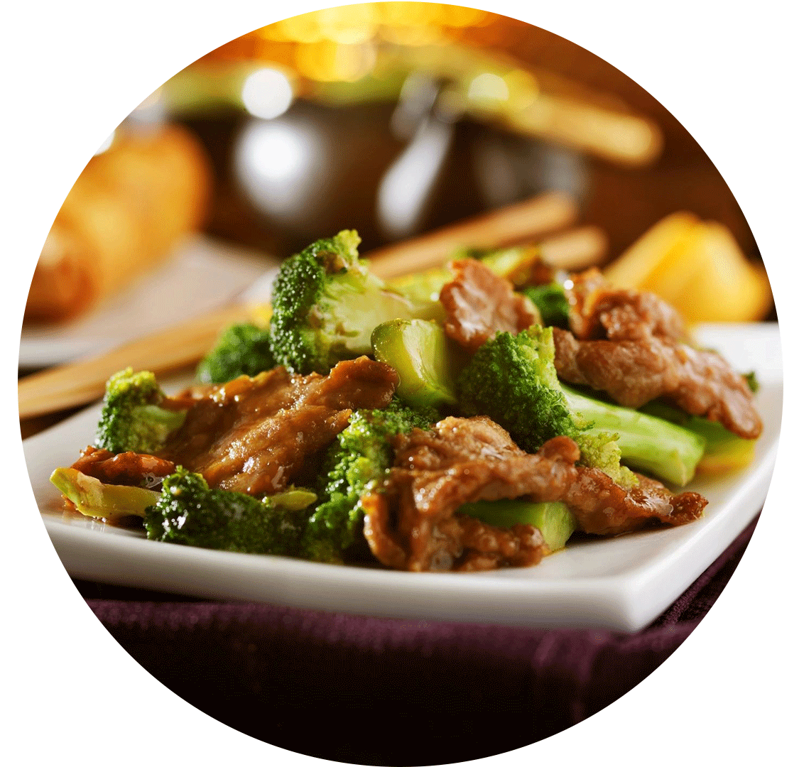 A plate of food with broccoli and meat.